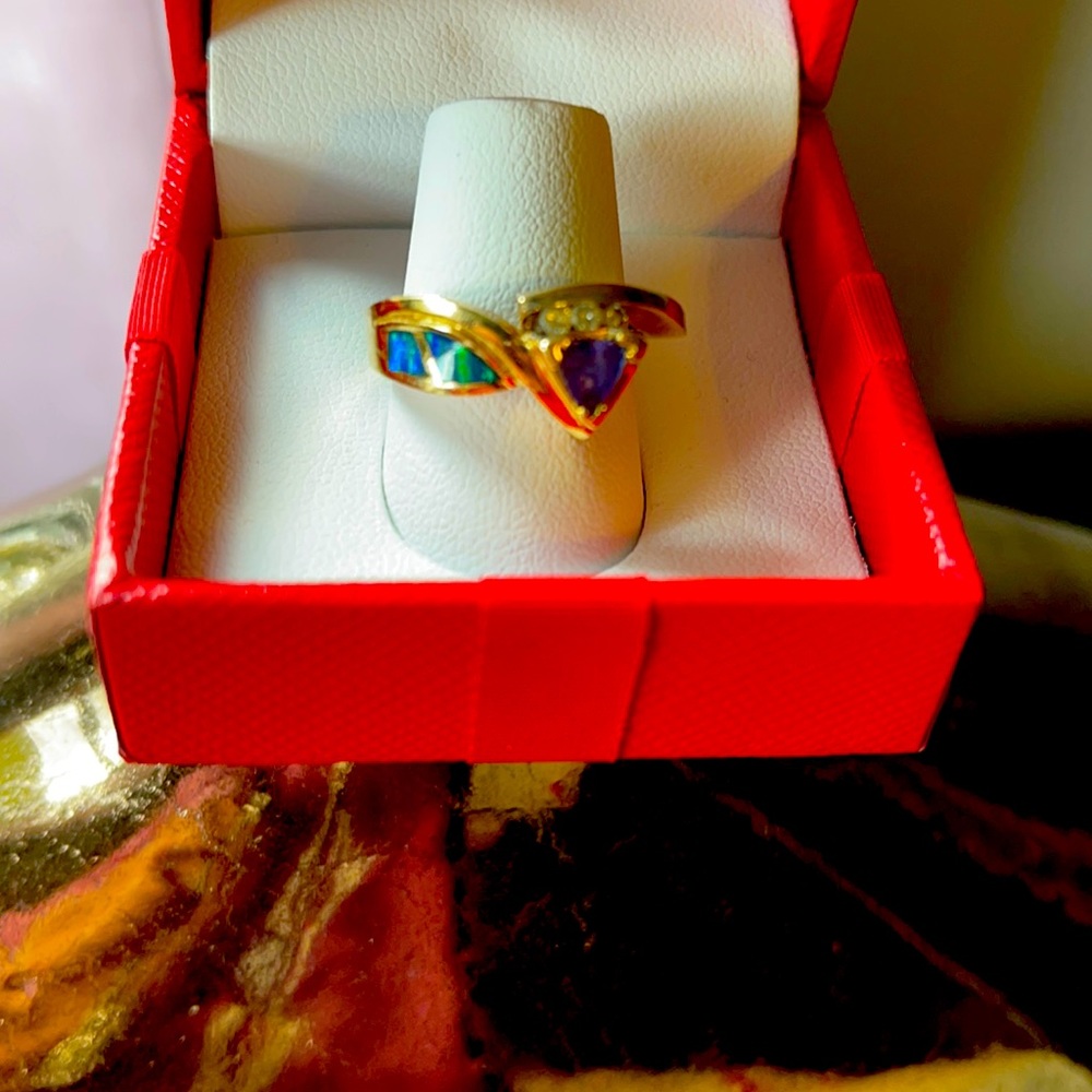 14 it purple tanzanite ring with small diamonds